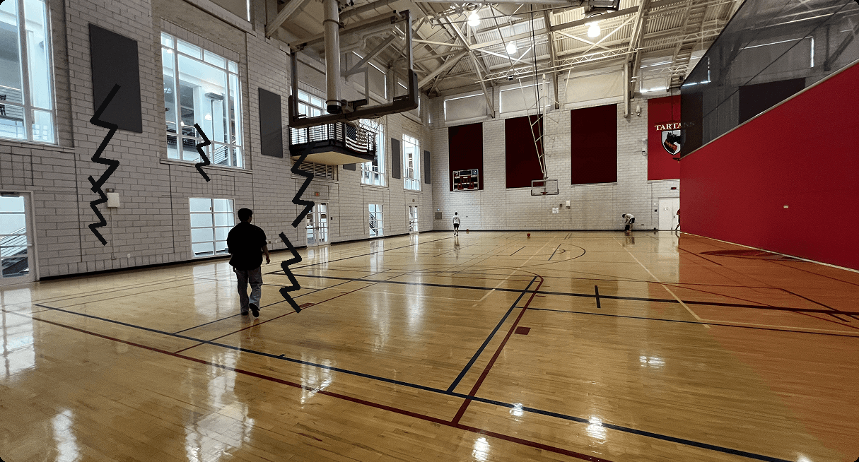 Voice feasibility testing in a noisy, gymnasium-like environment, annotated with noise markers